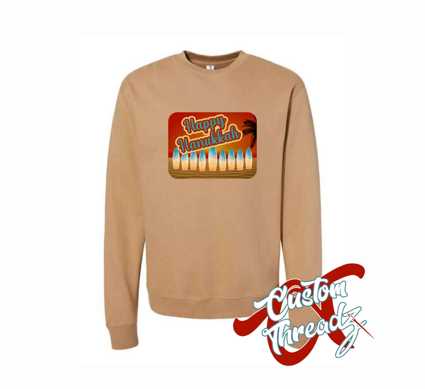 sandstone crewneck sweatshirt with hanukkah postcard menorah made out of surfboards on the beach at sunset DTG printed design