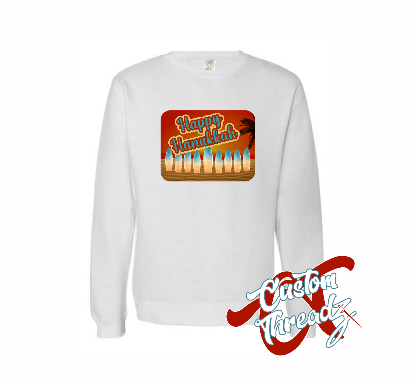white crewneck sweatshirt with hanukkah postcard menorah made out of surfboards on the beach at sunset DTG printed design