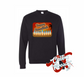 black crewneck sweatshirt with hanukkah postcard menorah made out of surfboards on the beach at sunset DTG printed design