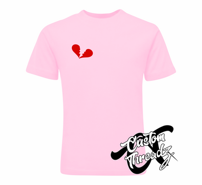 light pink youth tee with heartbreaker broken heart DTG printed design