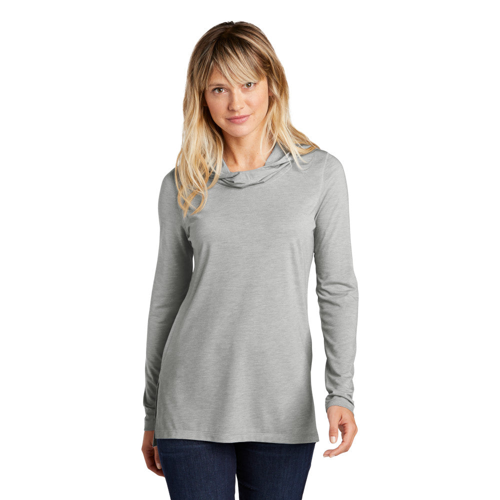 model wearing sport-tek womens triblend wicking long sleeve hoodie in light grey heather