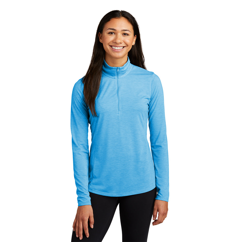 model wearing sport-tek womens triblend wicking 1/4-zip pullover in pond blue heather