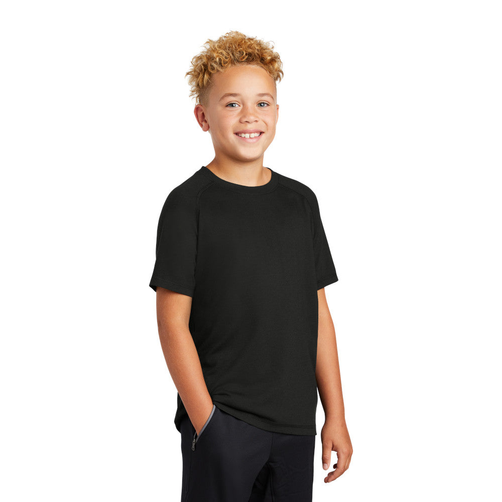 model wearing sport-tek youth tri-blend wicking raglan tee in black triad solid