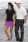 nike lifestyle image man and woman in nike polos golfing