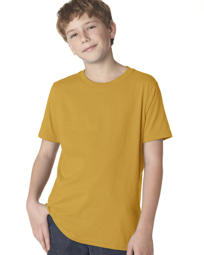 child model wearing next level youth tee in antique gold
