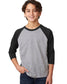 child model wearing next level youth 3/4 sleeve raglan tee in black dark heather grey