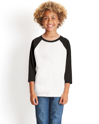 child model wearing next level youth 3/4 sleeve raglan tee in black white