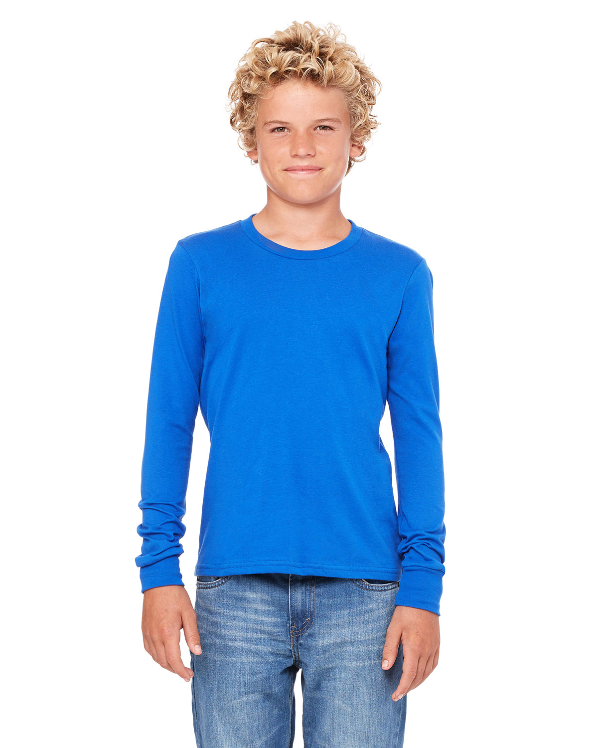 young boy wearing bella+canvas youth long sleeve tee true royal