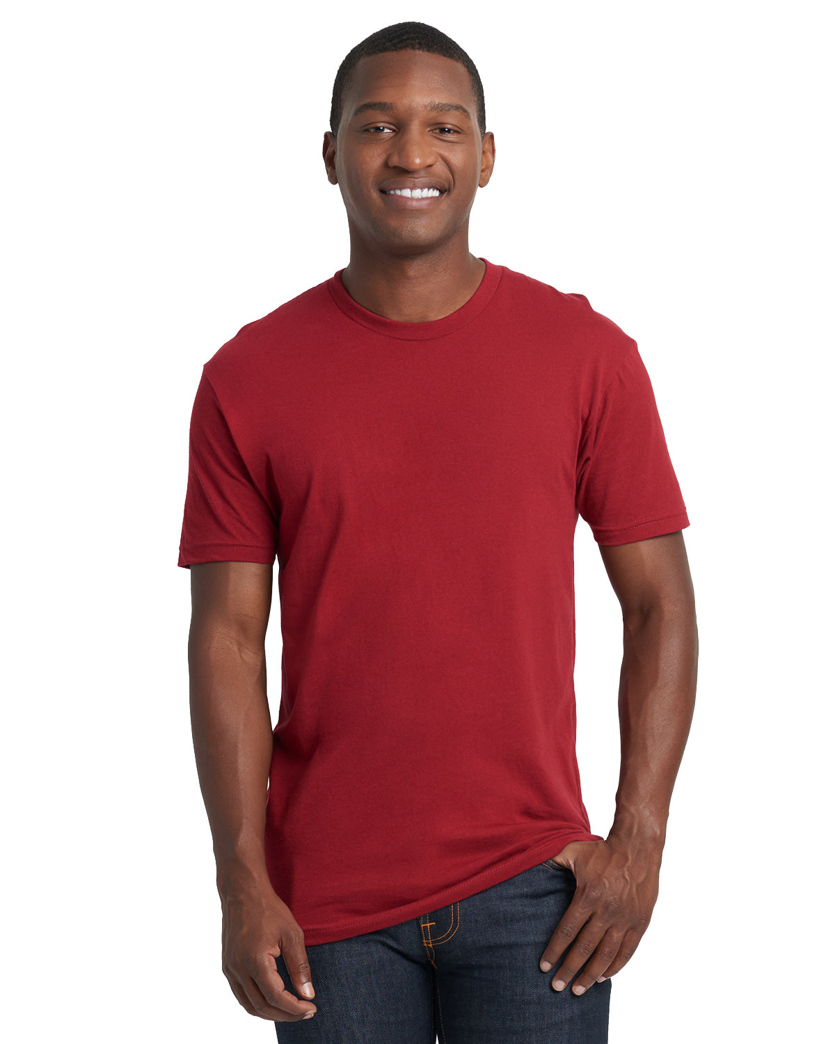model wearing next level unisex cotton tee in cardinal red