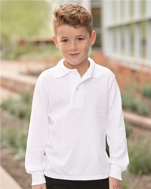 young child wearing jerzees white long sleeve polo