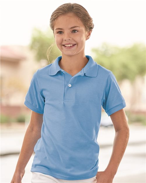 young girl wearing jerzees youth 50/50 polo