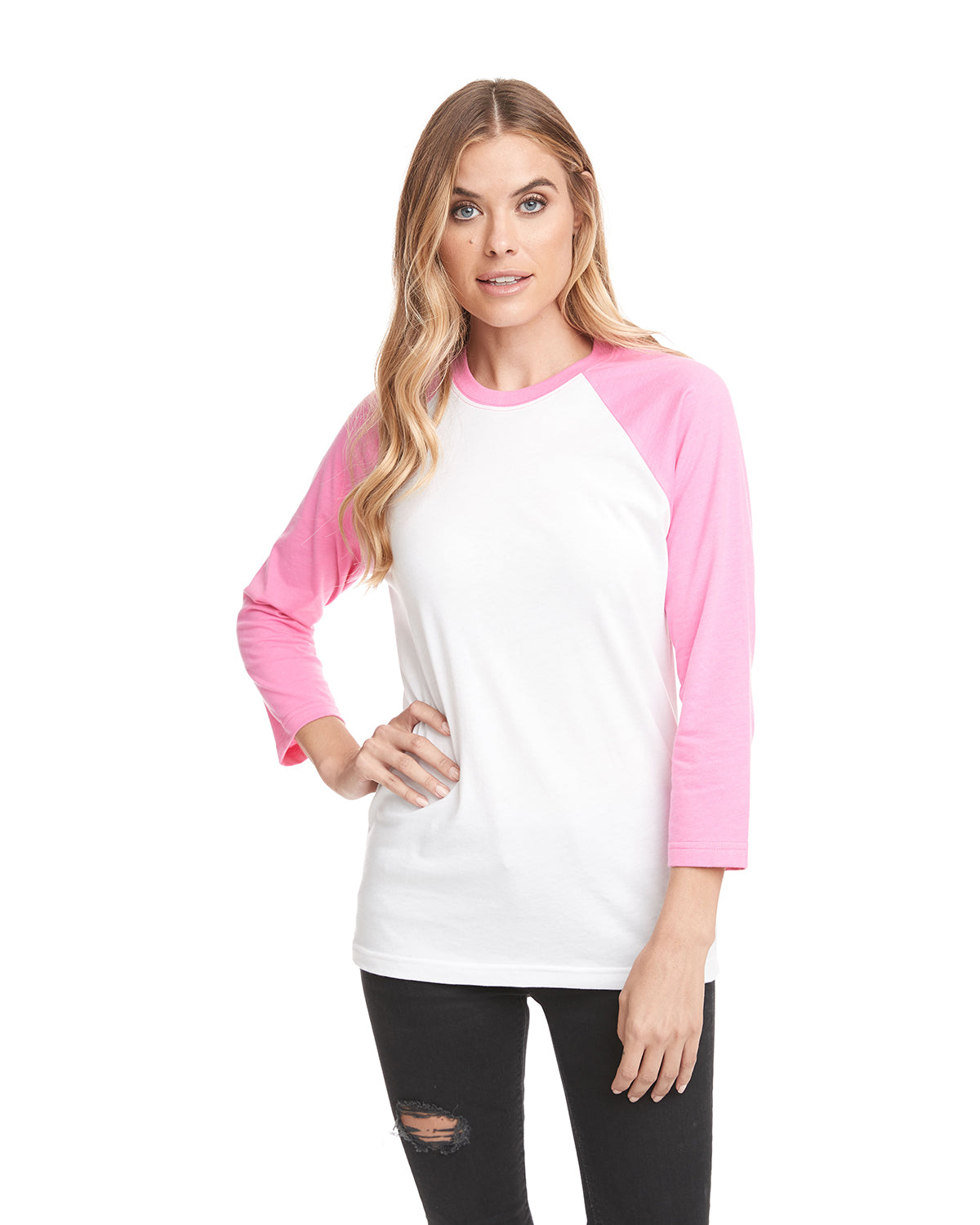 model wearing next level unisex CVC 3/4 sleeve raglan baseball tee in hot pink white