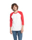model wearing next level unisex CVC 3/4 sleeve raglan baseball tee in red white