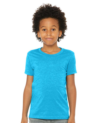 young boy wearing bella+canvas youth cvc t-shirt in neon blue