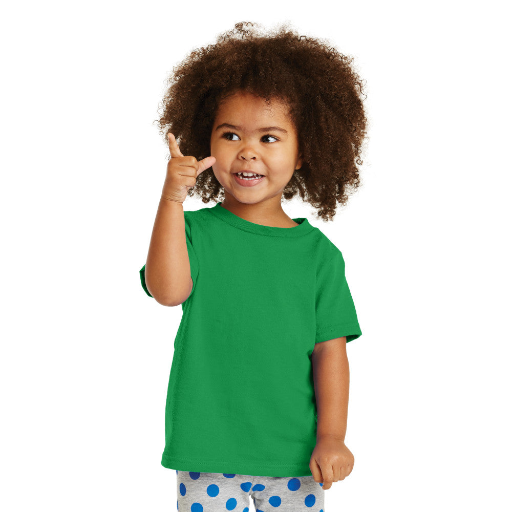 smiling child in port & company toddler core cotton tee clover green
