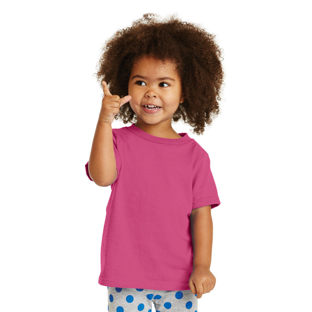 smiling child in port & company toddler core cotton tee sangria