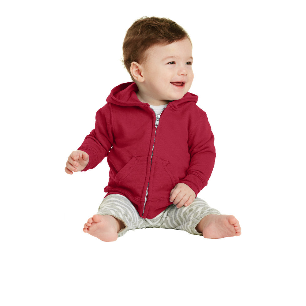smiling baby in port & company infant full zip hoodie red