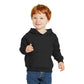 smiling child in port & company toddler hoodie jet black