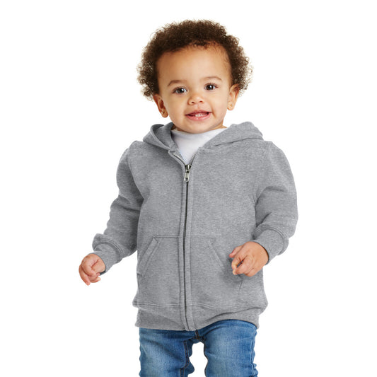 smiling child in port & company toddler full zip hoodie athletic heather