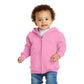 smiling child in port & company toddler full zip hoodie candy pink