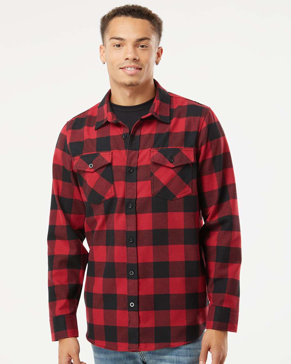 male model in independent trading co flannel shirt red black