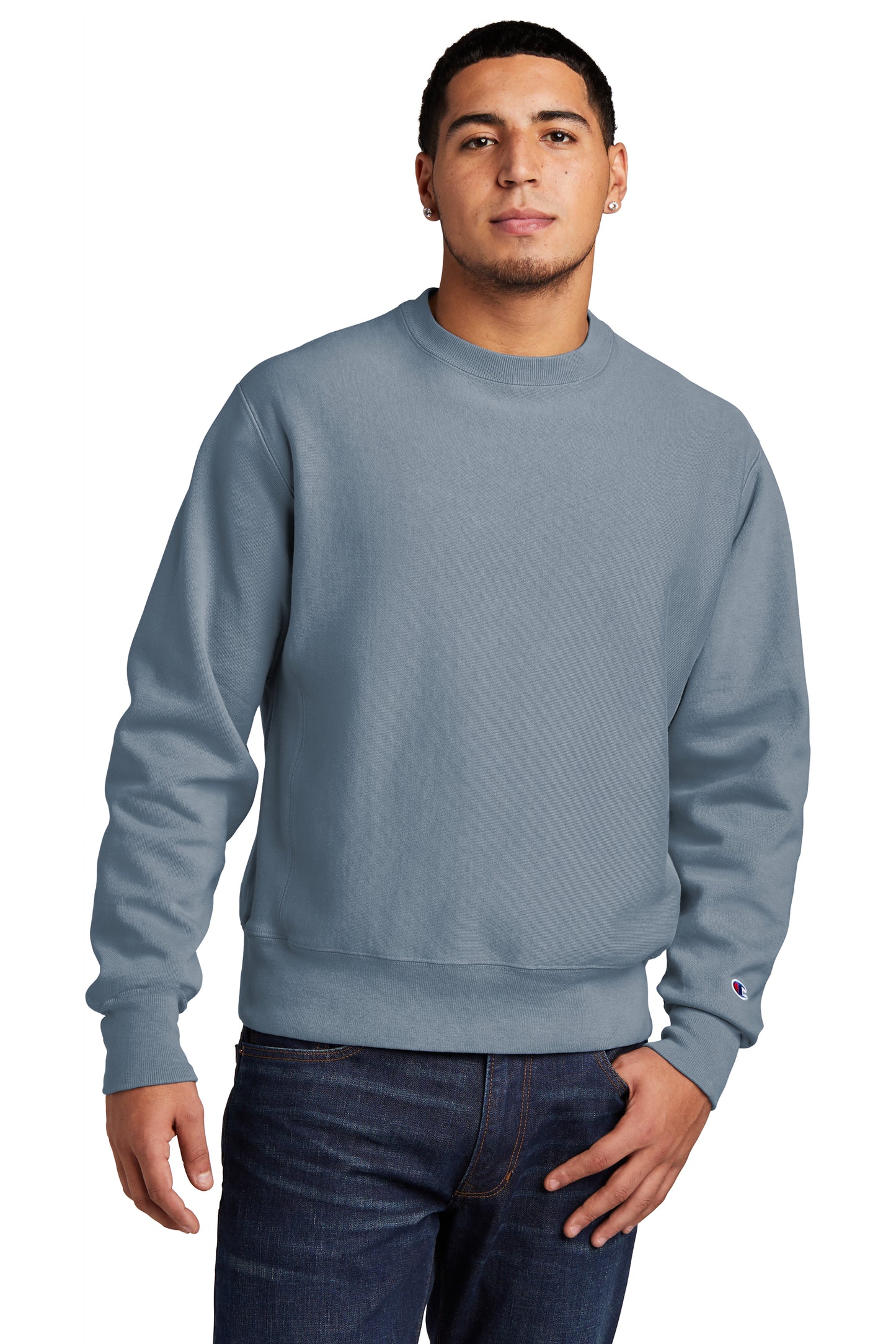 male model wearing champion adult garment dyed crewneck sweatshirt in saltwater blue