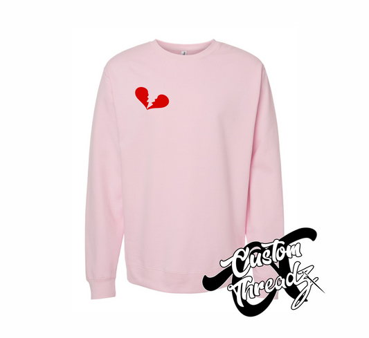 light pink crewneck sweatshirt with broken heart heartbreaker DTG printed design
