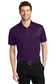 smiling male model wearing port authority silk touch polo in bright purple