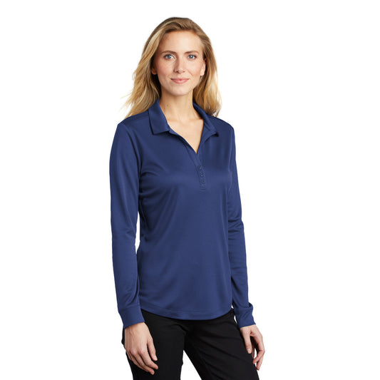 model wearing port authority womens silk touch long sleeve polo in royal