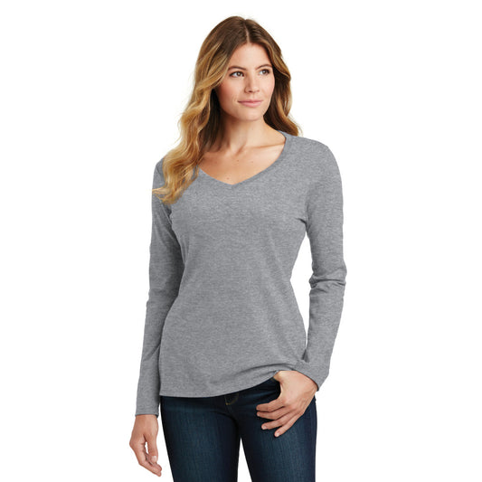 smiling model wearing port & company womens fan favorite v-neck long sleeve tee in athletic heather