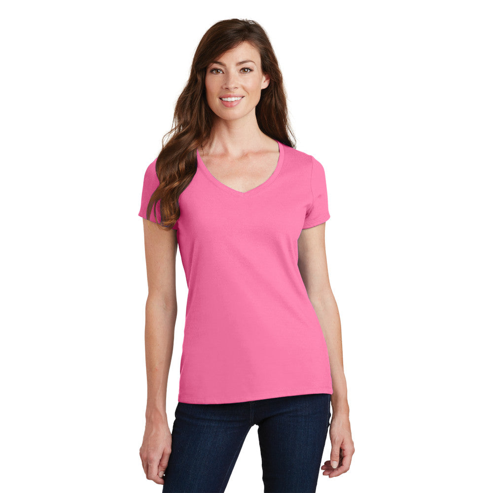 smiling model wearing port & company womens fan favorite v-neck tee in new pink