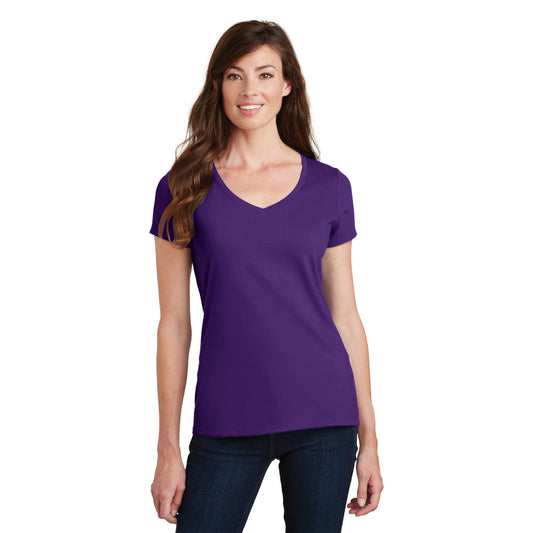 smiling model wearing port & company womens fan favorite v-neck tee in team purple