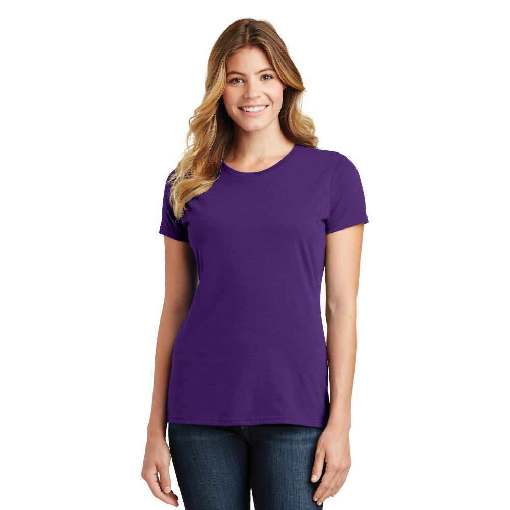 smiling model wearing port & company womens fan favorite tee in team purple