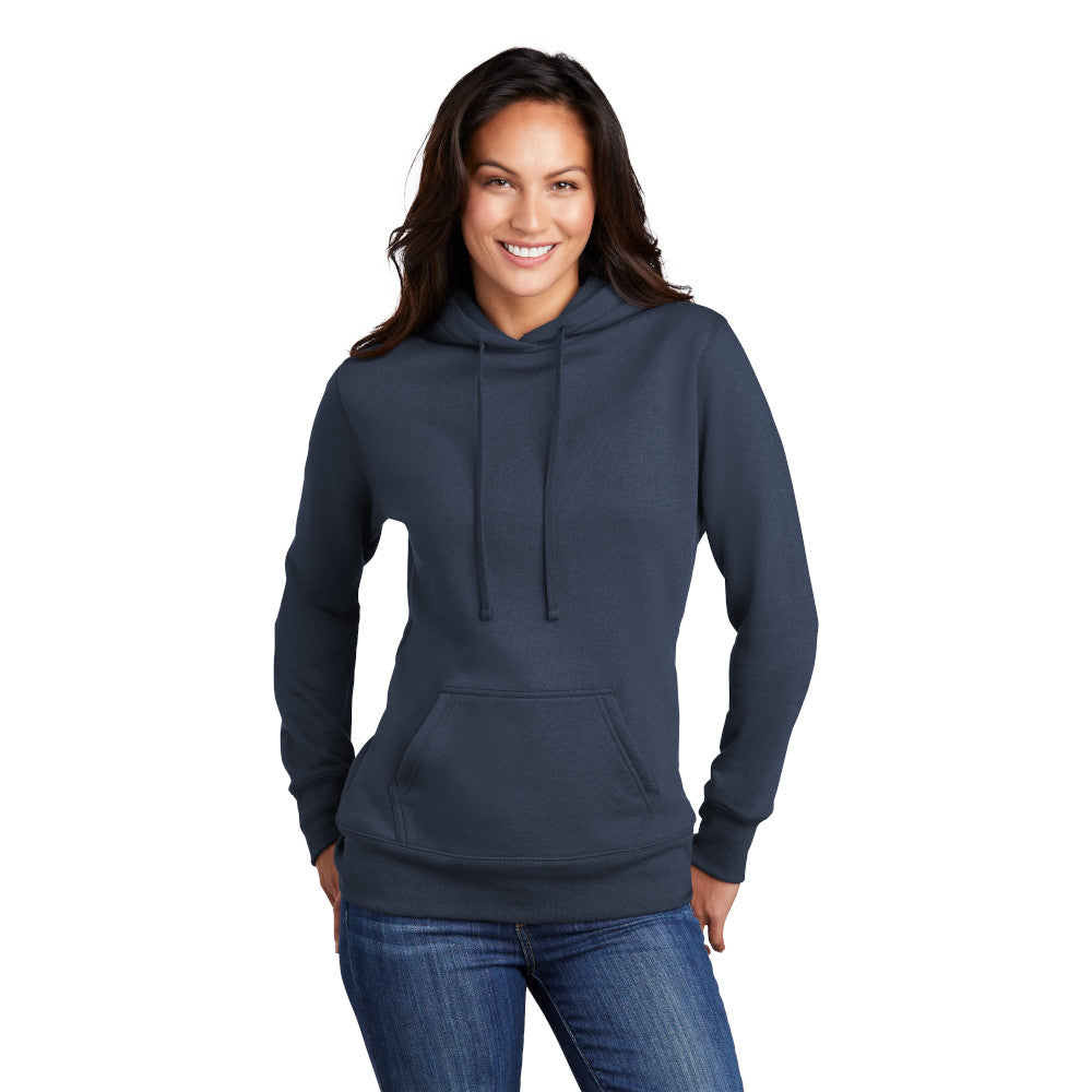 smiling model wearing port & company womens hoodie in navy
