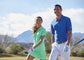 models on the golf course wearing nike dri-fit micro pique polo in game royal blue and mint green