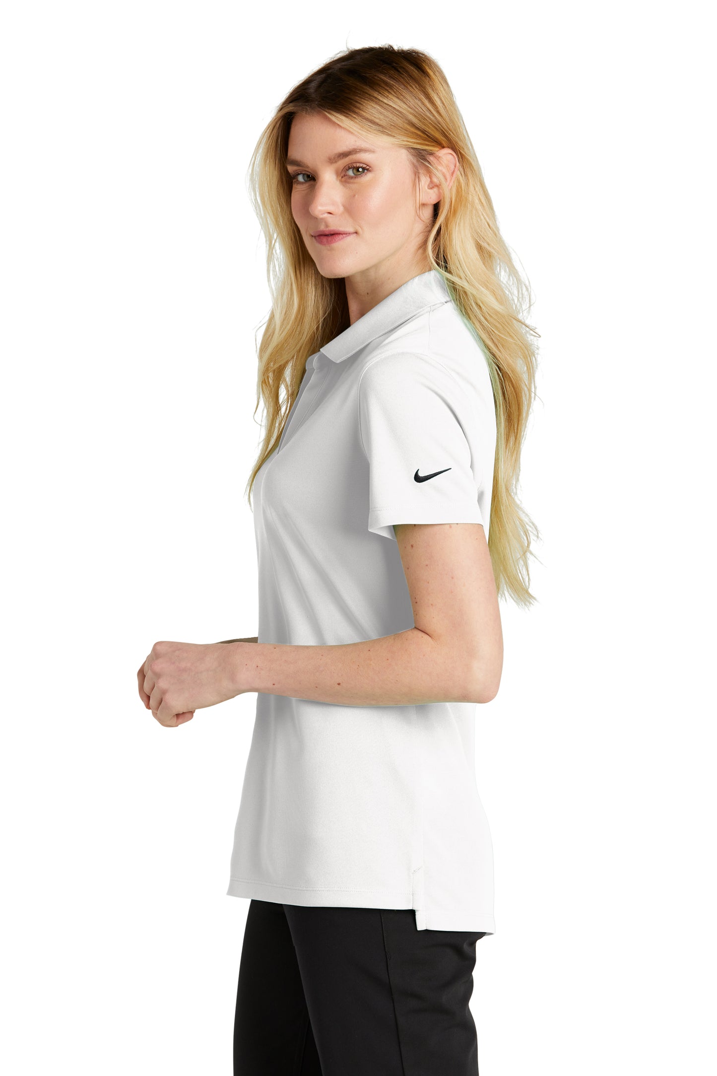 model wearing nike womens dri-fit micro pique polo in white
