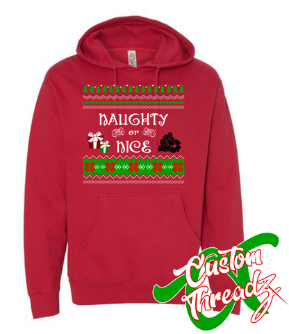 red hoodie with naughty or nice christmas style sweater DTG printed design