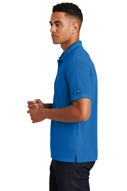 model wearing ogio caliber polo in electric blue