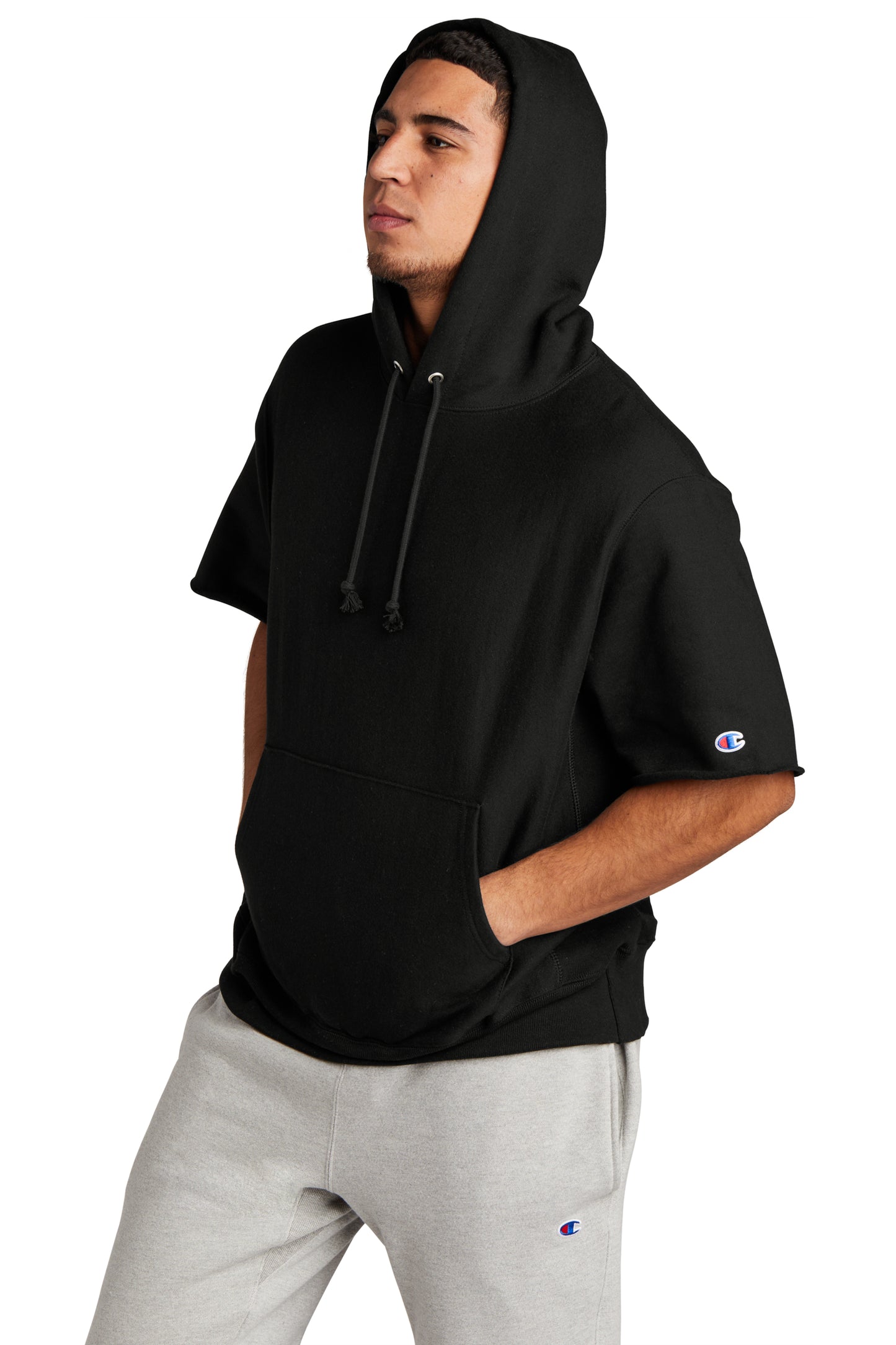 model wearing champion reverse weave short sleeve hoodie in black