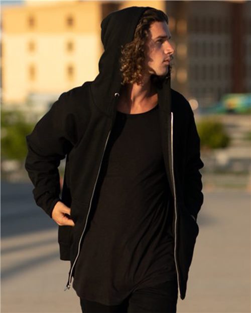 model wearing independent trading co full-zip hoodie in black
