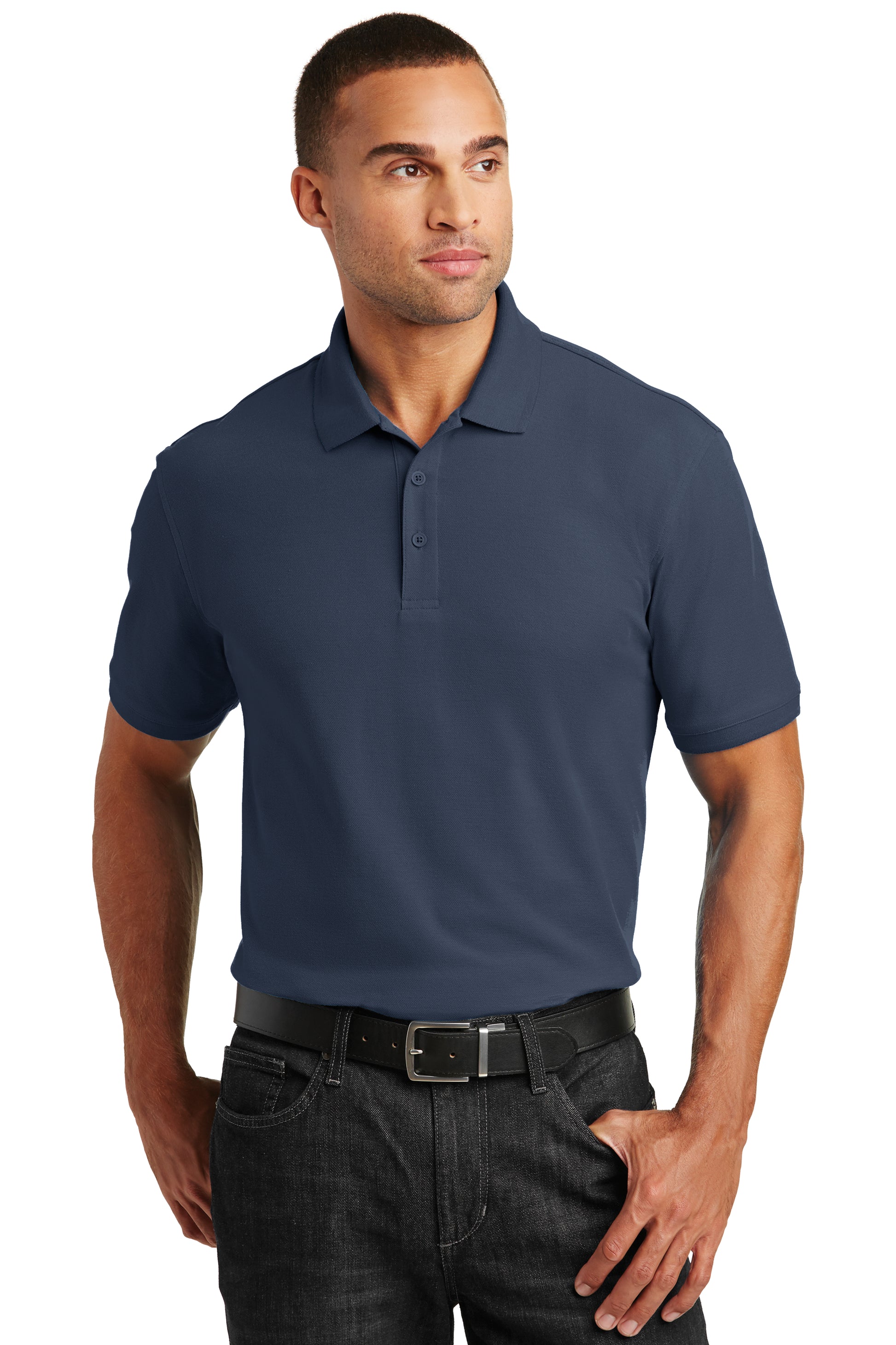 model wearing port authority tall core classic pique polo in river blue navy