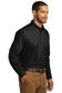model wearing port authority tall long sleeve carefree poplin shirt in deep black