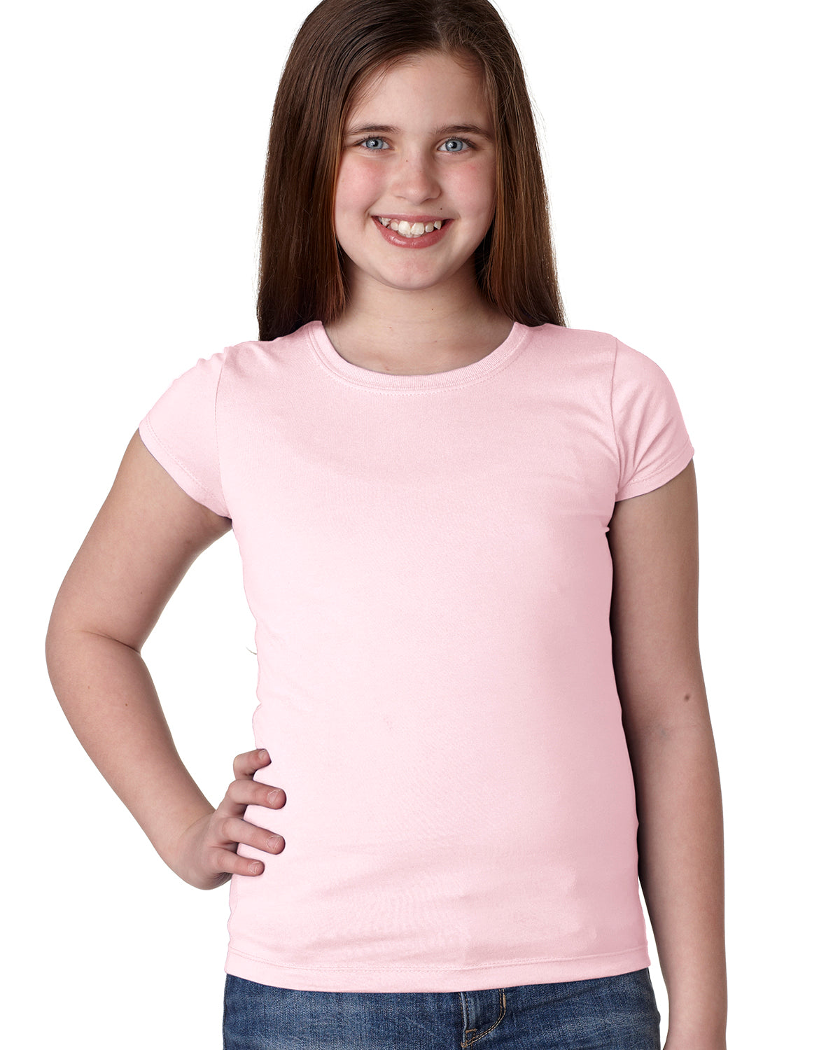 smiling model wearing next level youth girls princess tee light pink